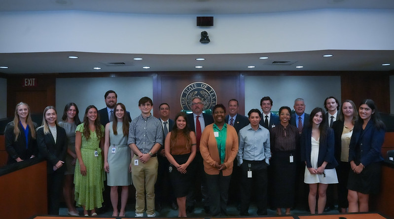 Commissioner Daniel poses for a group photo with Texas Interns Unite participants