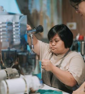 barista using machine